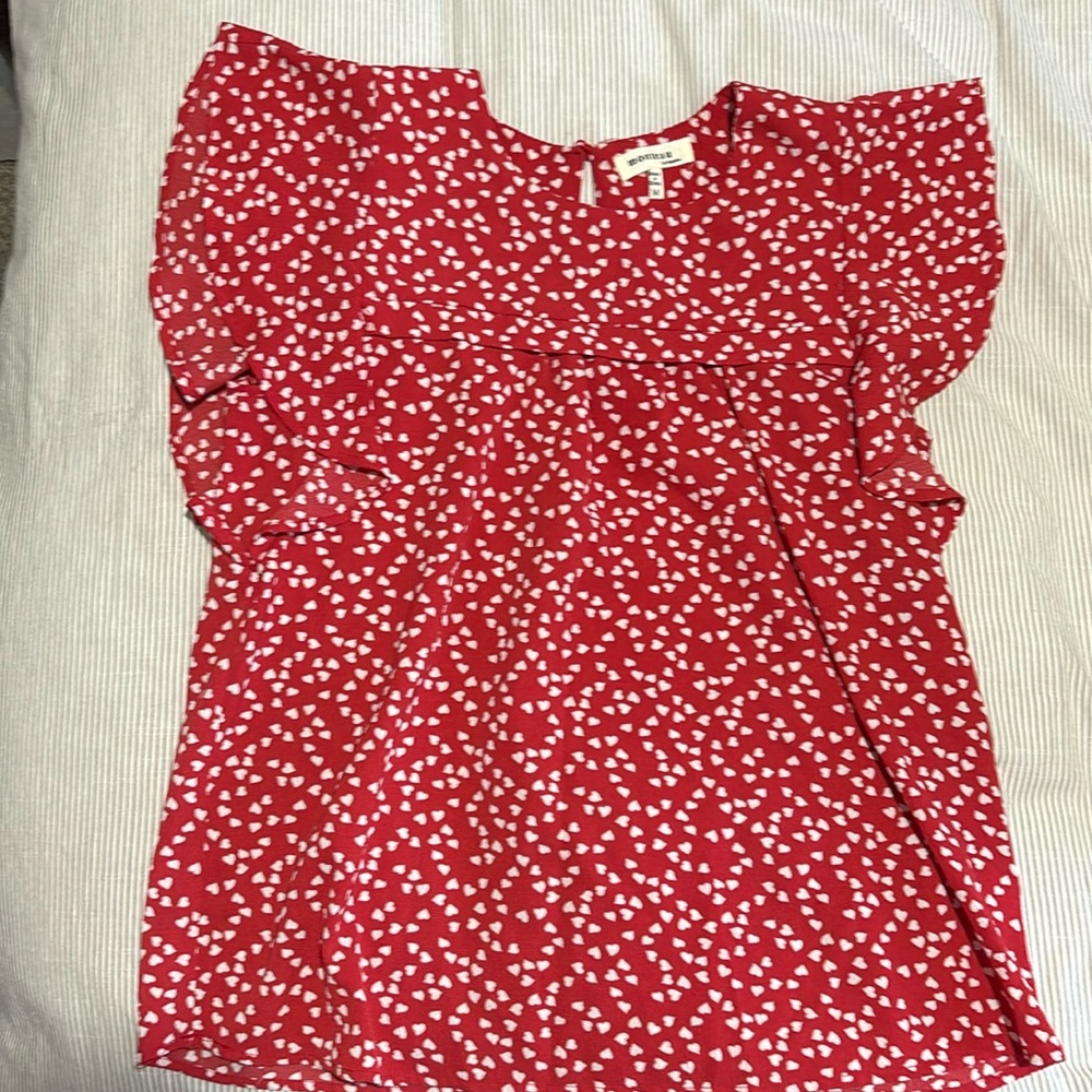 Red heart filled blouse.